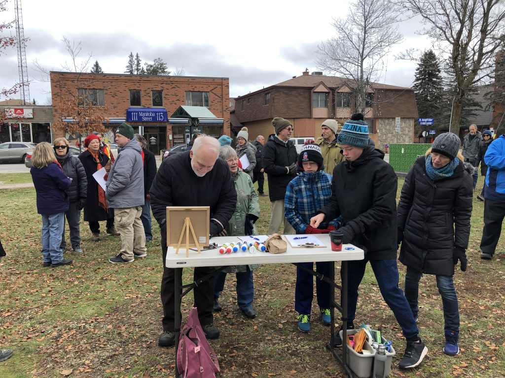 Signing petitions for November 29 climate strike in Muskoka