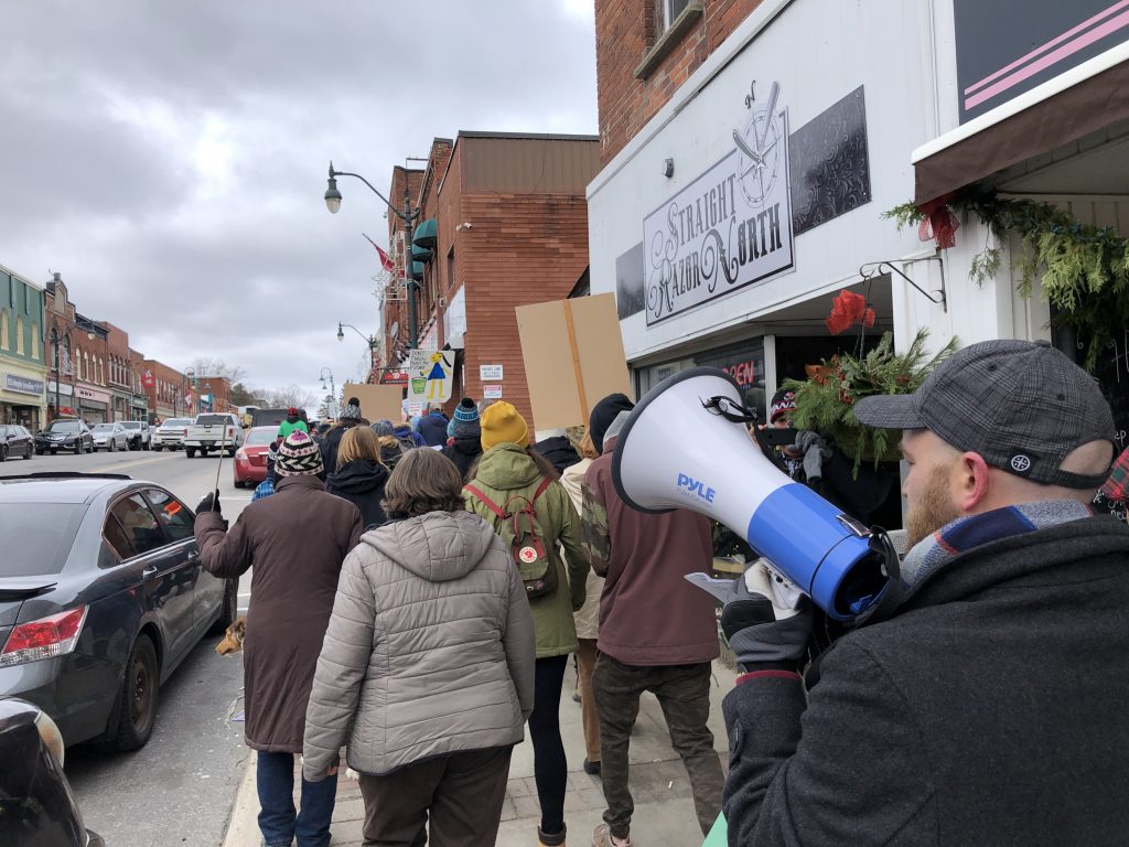 Climate strikers march up Manitoba Street in Bracebridge