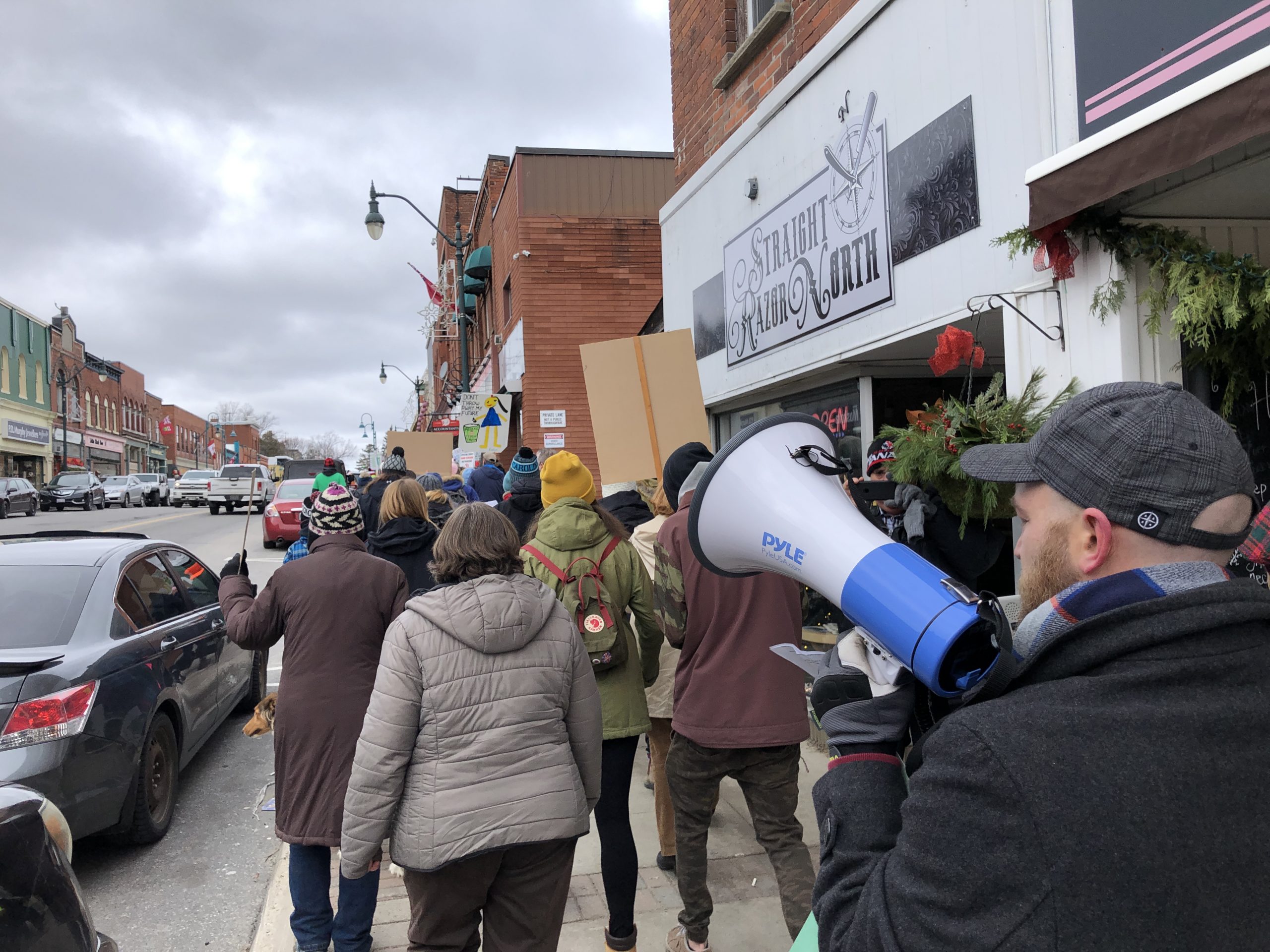 Climate strikers march up Manitoba Street in Bracebridge